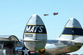 Aerobatics over the tailfins of a MATS plane